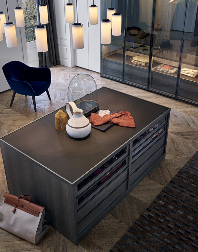 Poliform Senzafine island and wardrobes with Mad chair