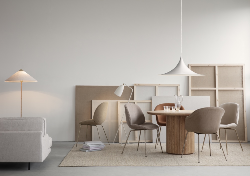 Gubi Moon dining table with Beetle and Bat dining chairs