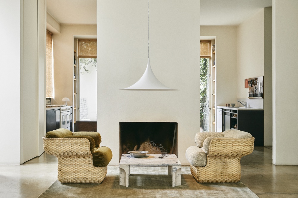 Gubi Bastek lounge chairs with Doric coffee table
